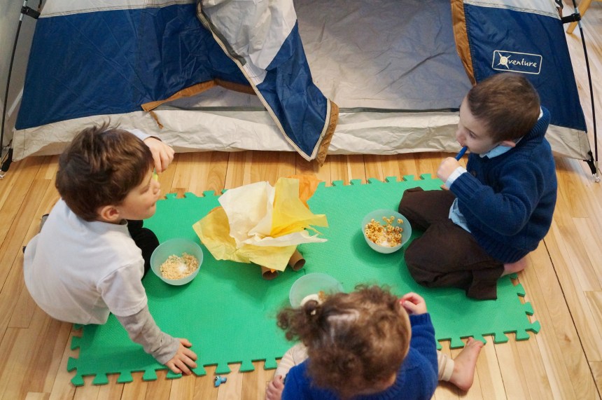 Eating cereal around the fire!