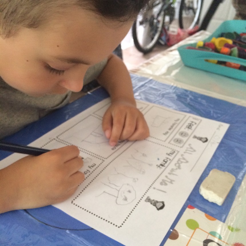 On the first day we did a little bio worksheet. I was really pleased and impressed with how focuses Ollie stayed on his work. They were probably some of the most detailed drawings he's done so far (since he usually wonders away;)